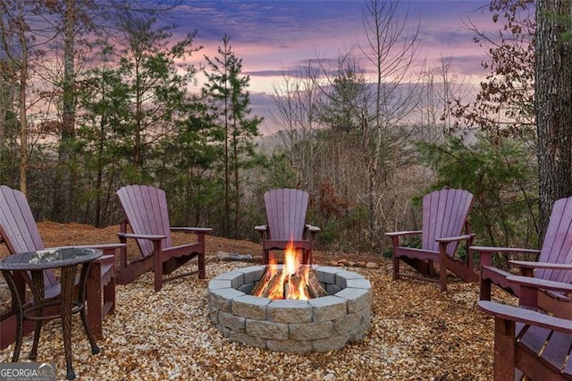 68 Shalom Vw, Blue Ridge, GA 30513 - patio terrace at dusk featuring a fire pit
