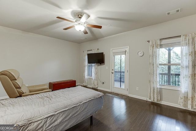 bedroom with access to exterior, dark wood-type flooring, baseboards, and a ceiling fan