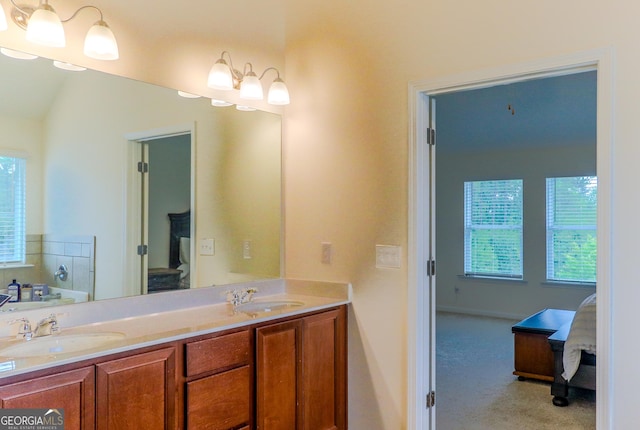 1800 Pearson St, Loganville, GA 30052 - full bathroom with ensuite bathroom, double vanity, a washtub, and a sink