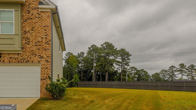1800 Pearson St, Loganville, GA 30052 - view of yard with a garage and fence