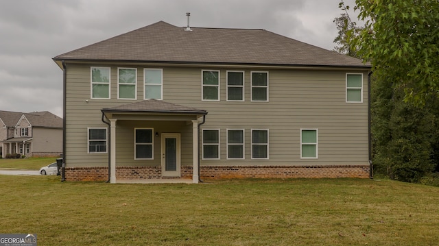 1800 Pearson St, Loganville, GA 30052 - view of front of house featuring a front lawn and a shingled roof