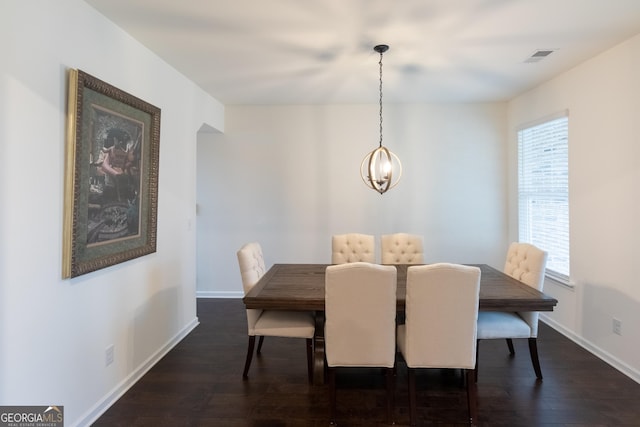 1800 Pearson St, Loganville, GA 30052 - dining room with dark wood-style floors and baseboards