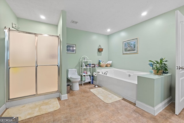 575 Chuli Rd, Locust Grove, GA 30248 - bathroom with a garden tub, a stall shower, and recessed lighting
