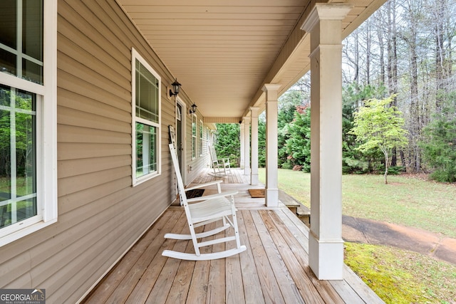 575 Chuli Rd, Locust Grove, GA 30248 - porch featuring a lawn