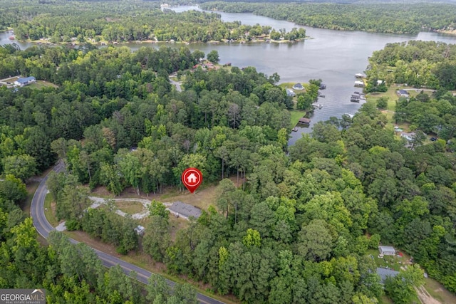 138 Forest Hill Dr, Eatonton, GA 31024 - drone / aerial view featuring a water view and a wooded view