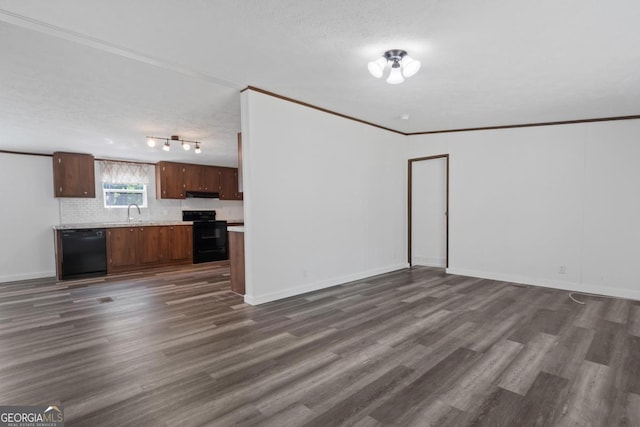 138 Forest Hill Dr, Eatonton, GA 31024 - unfurnished living room featuring baseboards, dark wood-style flooring, ornamental molding, and a textured ceiling