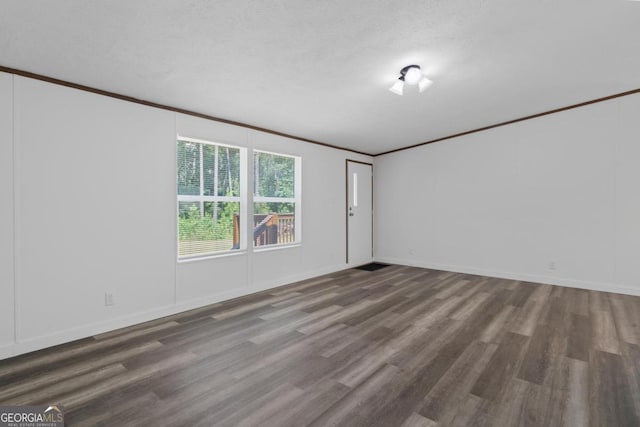 138 Forest Hill Dr, Eatonton, GA 31024 - unfurnished room featuring baseboards, wood finished floors, and ornamental molding