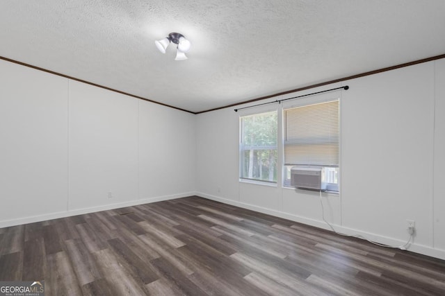 138 Forest Hill Dr, Eatonton, GA 31024 - spare room with a textured ceiling, baseboards, ornamental molding, wood finished floors, and cooling unit