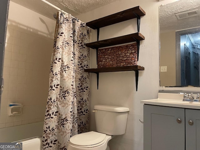 full bathroom featuring toilet, shower / tub combo with curtain, vanity, a textured ceiling, and visible vents
