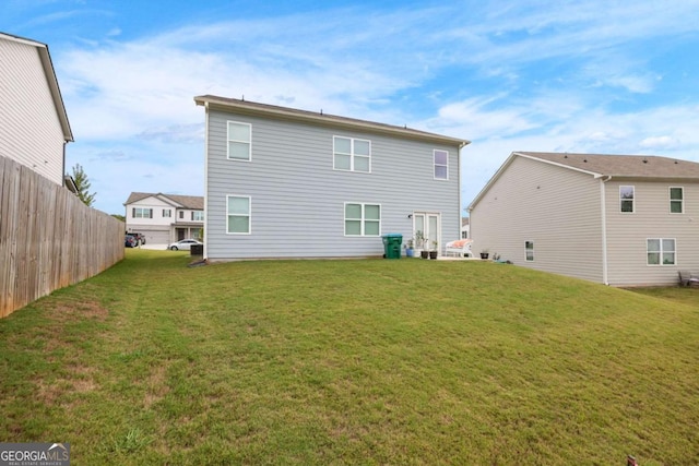138 Brode Ln, Pendergrass, GA 30567 - rear view of property with fence and a yard