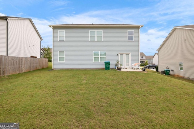 138 Brode Ln, Pendergrass, GA 30567 - back of property with a lawn, a patio area, and fence
