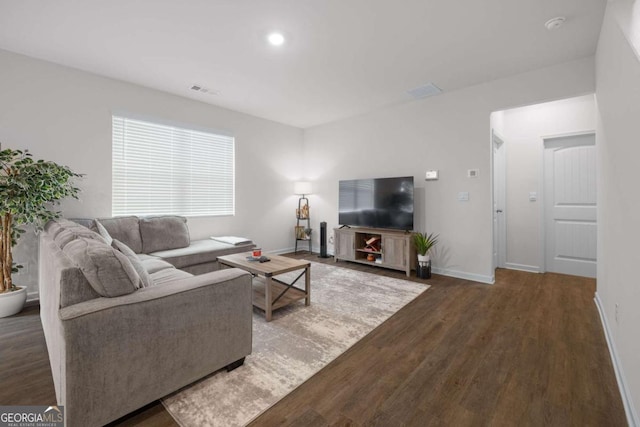 138 Brode Ln, Pendergrass, GA 30567 - living area featuring baseboards, wood finished floors, and visible vents