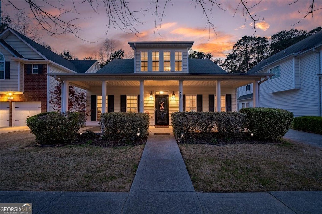 4654 Liberty Square Dr, Acworth, GA 30101 - view of front facade with a front yard and a porch