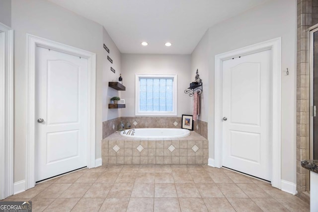 full bathroom with recessed lighting, tile patterned flooring, and a garden tub