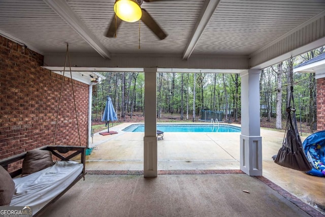 pool featuring a patio and ceiling fan