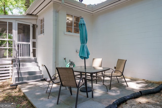 view of patio featuring outdoor dining space