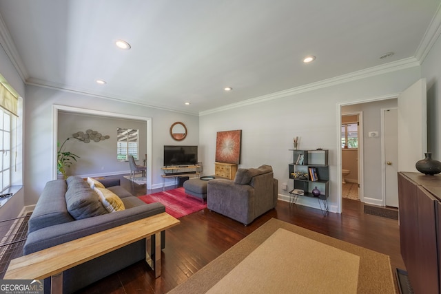 living area featuring baseboards, recessed lighting, crown molding, and dark wood finished floors