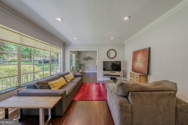 living area with baseboards, recessed lighting, ornamental molding, and dark wood-type flooring
