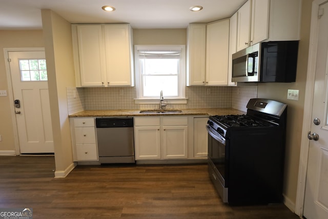 kitchen featuring a sink, white cabinetry, and appliances with stainless steel finishes