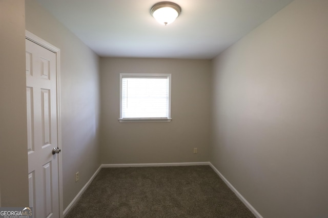 4044 Lindsey Dr, Decatur, GA 30035 - spare room featuring baseboards and dark colored carpet