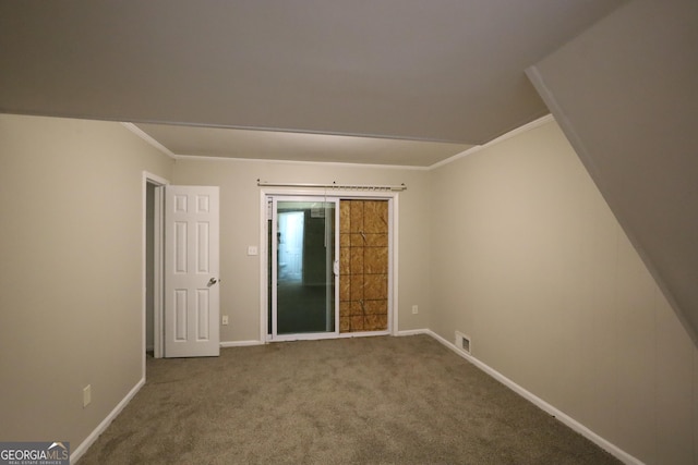 4044 Lindsey Dr, Decatur, GA 30035 - carpeted spare room with baseboards, ornamental molding, and visible vents