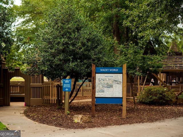 view of community with fence