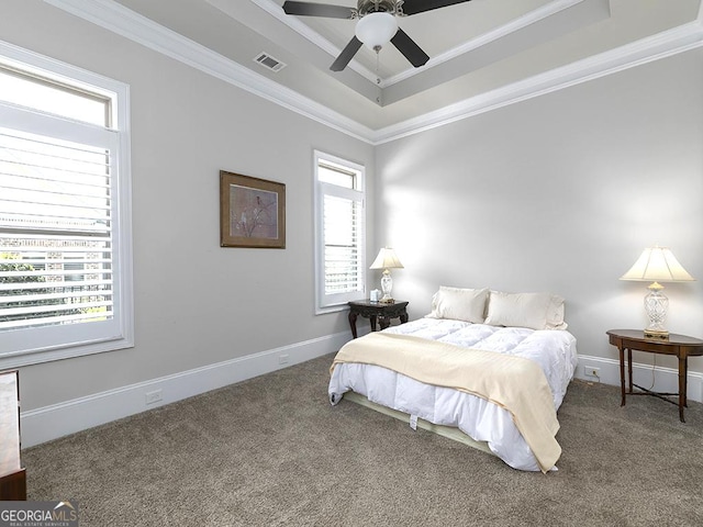 4845 Josie Way NW, Acworth, GA 30101 - carpeted bedroom featuring crown molding, a tray ceiling, baseboards, ceiling fan, and visible vents