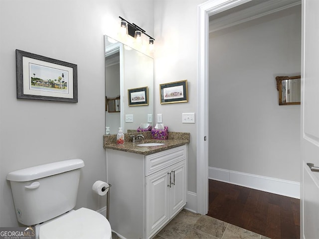 4845 Josie Way NW, Acworth, GA 30101 - half bathroom with baseboards, toilet, vanity, and wood finished floors