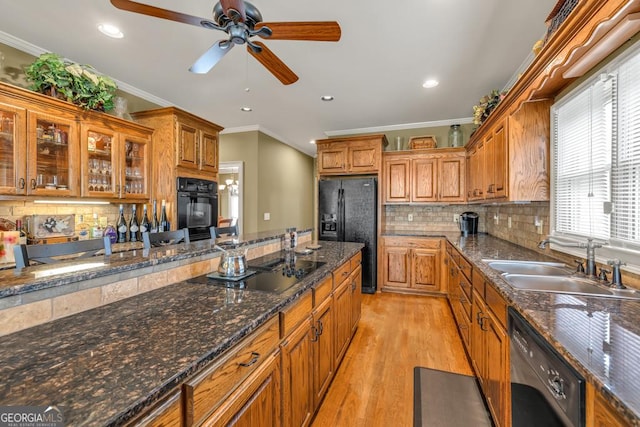 2323 Council Ln, Buford, GA 30519 - kitchen featuring black appliances, ornamental molding, ceiling fan, decorative backsplash, and light wood finished floors