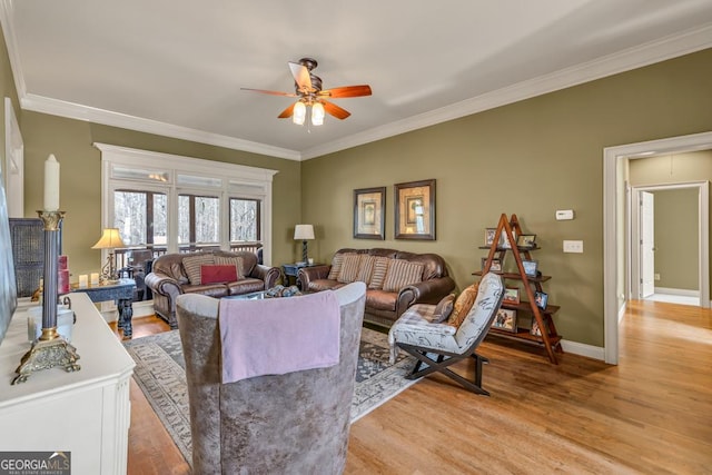 2323 Council Ln, Buford, GA 30519 - living room featuring a ceiling fan, light wood-type flooring, and crown molding