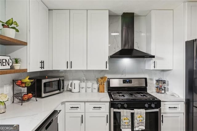 kitchen featuring open shelves, backsplash, wall chimney range hood, white cabinets, and black appliances