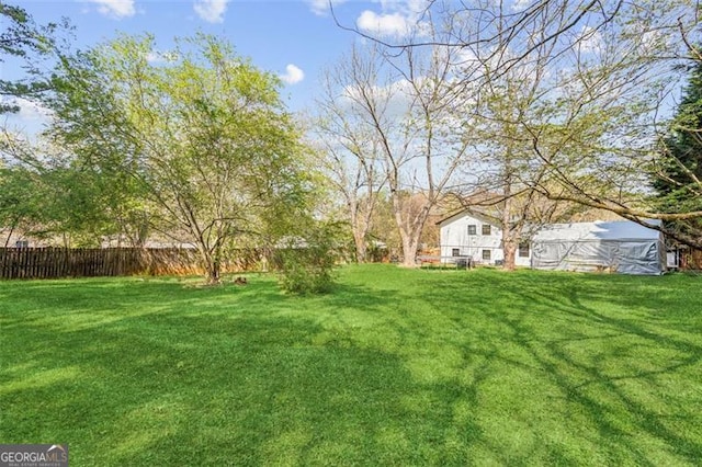 view of yard featuring fence