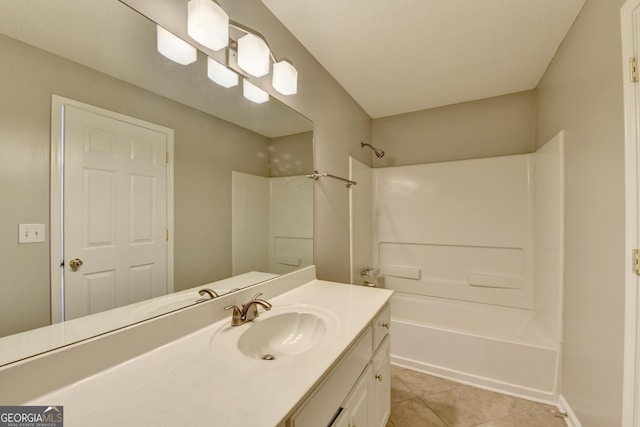 full bathroom with tile patterned flooring, vanity, and bathing tub / shower combination