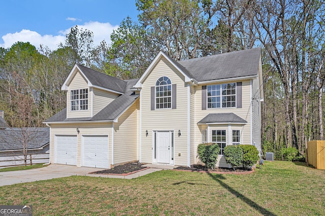 traditional-style home featuring driveway
