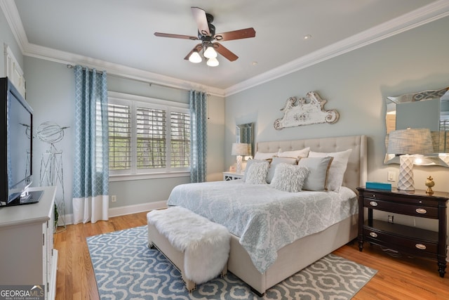 55 Hazelbrook Way, Acworth, GA 30101 - bedroom featuring baseboards, ornamental molding, a ceiling fan, and light wood-type flooring