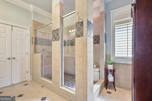 55 Hazelbrook Way, Acworth, GA 30101 - bathroom featuring a shower stall, tile walls, tile patterned flooring, and ornamental molding