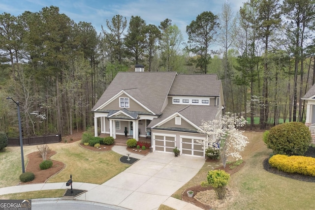 55 Hazelbrook Way, Acworth, GA 30101 - craftsman inspired home featuring a chimney, a front lawn, driveway, a shingled roof, and a porch