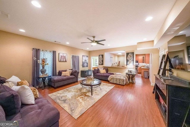 4408 Meadowwood Dr, Loganville, GA 30052 - living room with ceiling fan, recessed lighting, and light wood finished floors