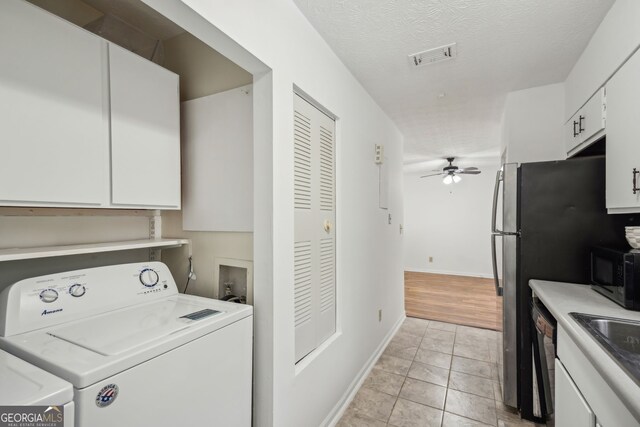 6240 Overlook Rd Unit 6240, Peachtree Corners, GA 30092 - washroom with a ceiling fan, washer and clothes dryer, and baseboards