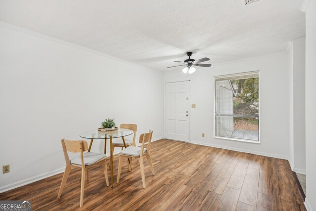 6240 Overlook Rd Unit 6240, Peachtree Corners, GA 30092 - living area with wood finished floors, a ceiling fan, ornamental molding, and baseboards