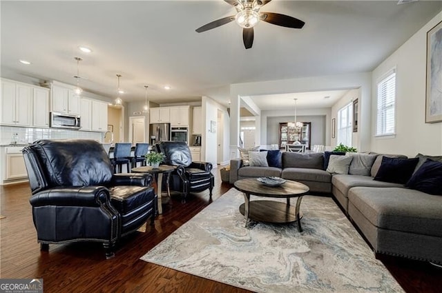 4870 Odum View Ln, Cumming, GA 30040 - living room featuring a ceiling fan, dark wood-type flooring, and recessed lighting