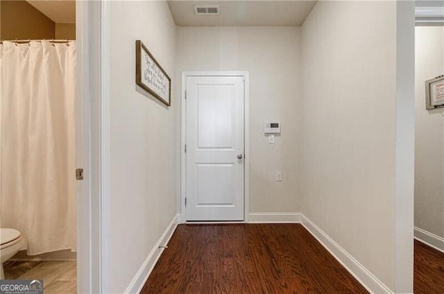 4870 Odum View Ln, Cumming, GA 30040 - corridor featuring dark wood-type flooring and baseboards