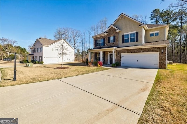 4870 Odum View Ln, Cumming, GA 30040 - craftsman inspired home with driveway, a front yard, a garage, and brick siding