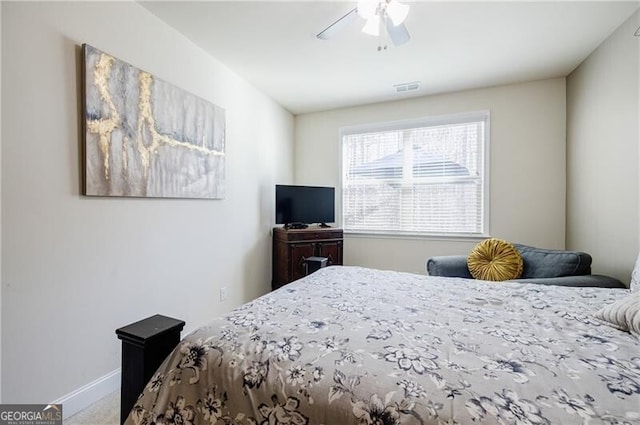 4870 Odum View Ln, Cumming, GA 30040 - carpeted bedroom with baseboards and a ceiling fan