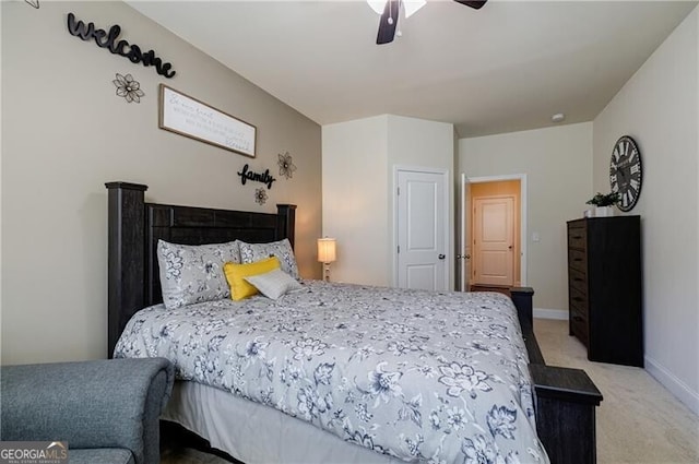 4870 Odum View Ln, Cumming, GA 30040 - bedroom with light colored carpet and ceiling fan