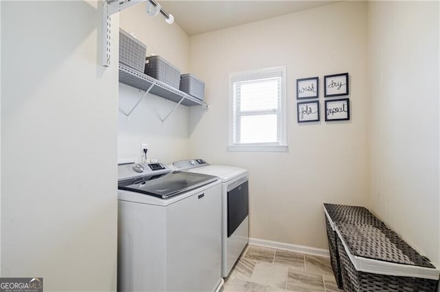 4870 Odum View Ln, Cumming, GA 30040 - laundry room with washer and clothes dryer and baseboards