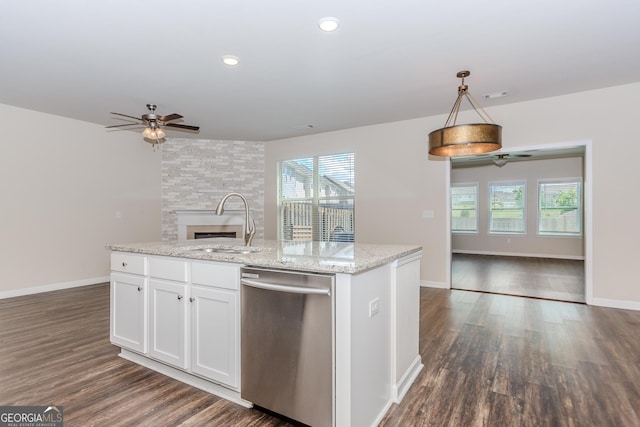 3627 Canyon Springs Dr, Oakwood, GA 30566 - unfurnished living room with dark wood-type flooring, visible vents, a large fireplace, ceiling fan, and baseboards