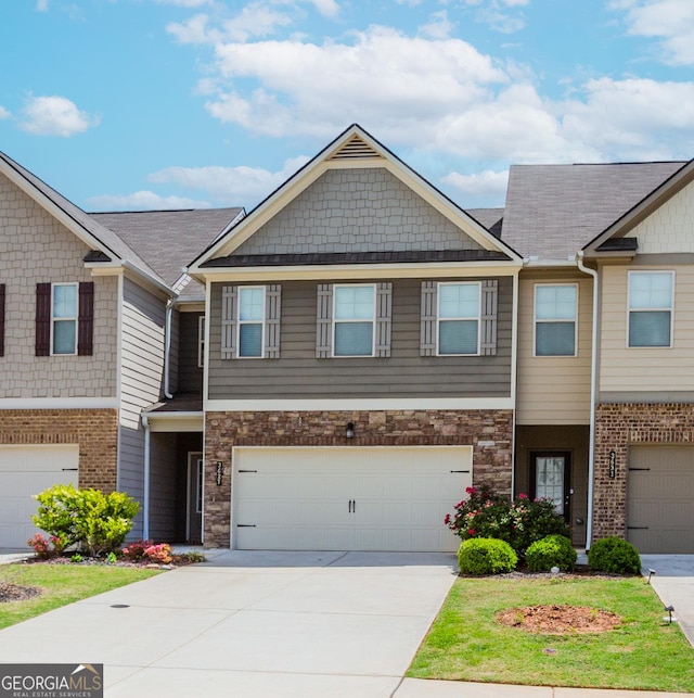 3627 Canyon Springs Dr, Oakwood, GA 30566 - view of property featuring concrete driveway and a garage