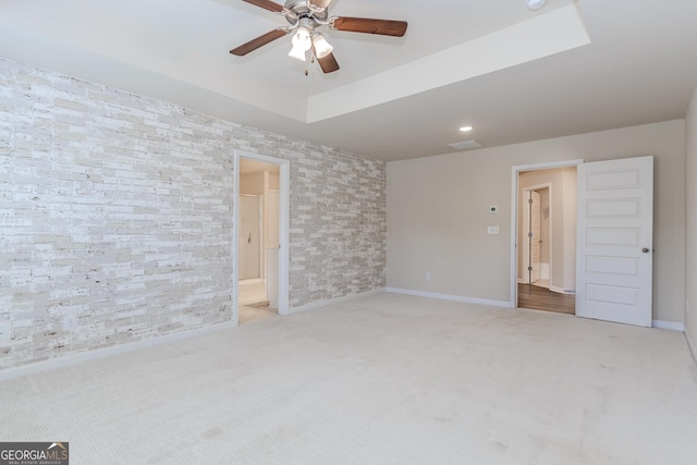 3627 Canyon Springs Dr, Oakwood, GA 30566 - bedroom with a tray ceiling, carpet, and ceiling fan
