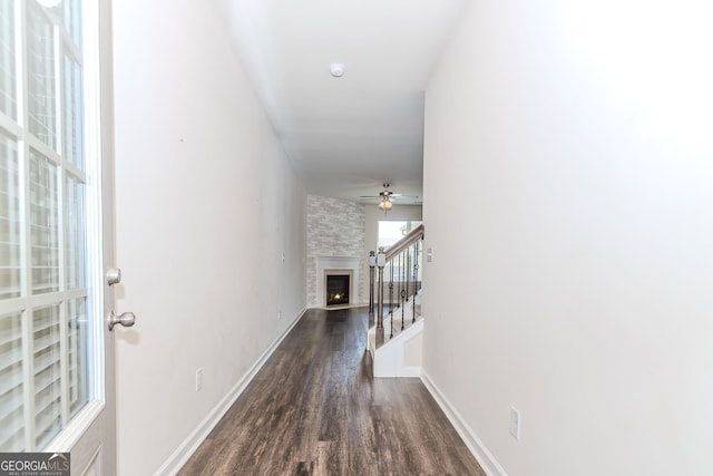 3627 Canyon Springs Dr, Oakwood, GA 30566 - hallway with stairs, baseboards, and wood finished floors